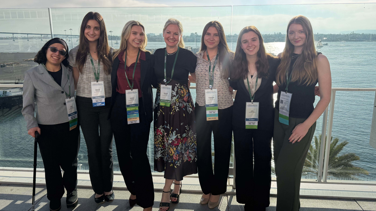 Quinnipiac honors students in San Diego smile for a photo